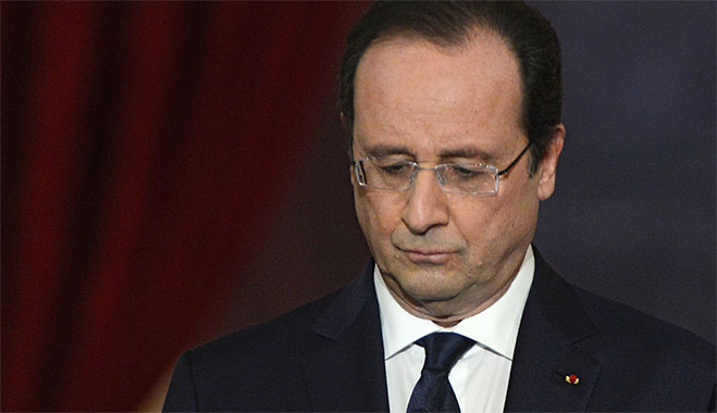 Je suis désolé? Francois Hollande looks sheepish yesterday at a press conference where he was quizzed about his alleged affair with French actress Julie Gayet. The allegations are likely to harm his already flagging popularity