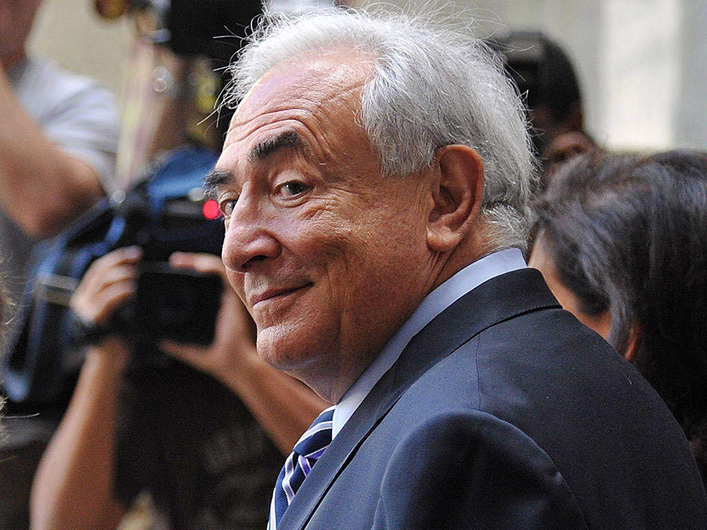 Dominique Strauss-Kahn is seen leaving a Criminal Court after a status hearing on the sexual assault charges against him in New York City