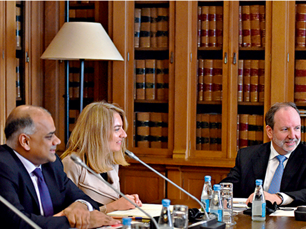 (From L) Subir Lall of the IMF, Isabel Vansteenkiste from the ECB and Head of EU delegation Sean Berrigan listen to Vieira da Silva, Head of the committee nominated by the Portuguese Parliament during a meeting about the financial assistance programme