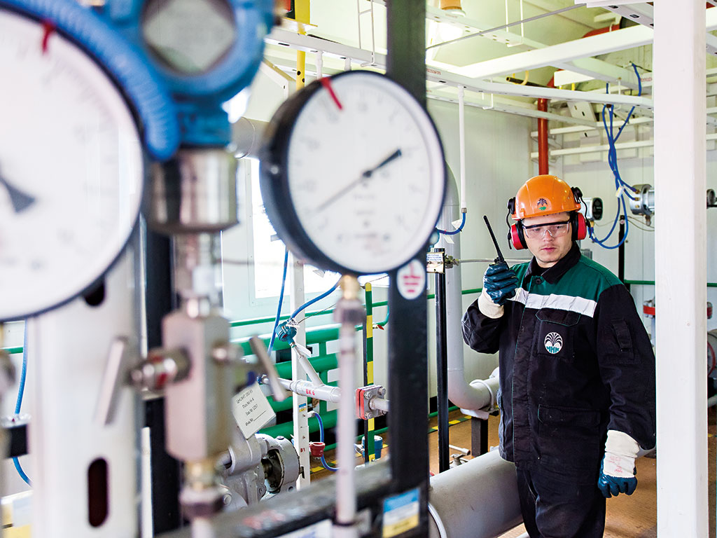 A worker monitors gas pressure at Irkutsk’s main oil and gas condensate development, Irkutsk, East Siberia