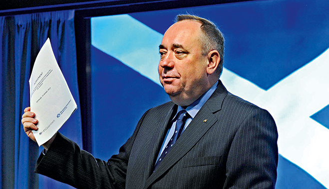 Alex Salmond holds up the signed agreement for a referendum on Scottish independence. The Scottish First Minister passionately believes the country would be better as its own state; however many businesses are concerned independence could put their finances in the red