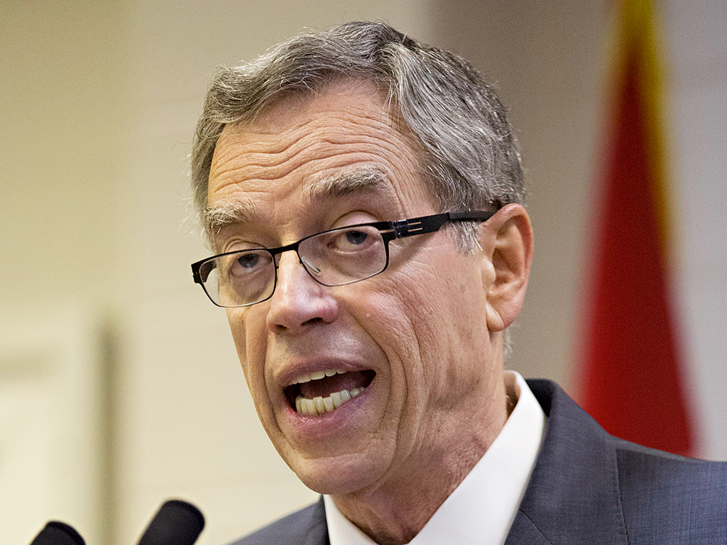 Canadian Finance Minister Joe Oliver, who has said that progress towards giving Canada a unified national securities regulatory system is "moving at a good pace"
