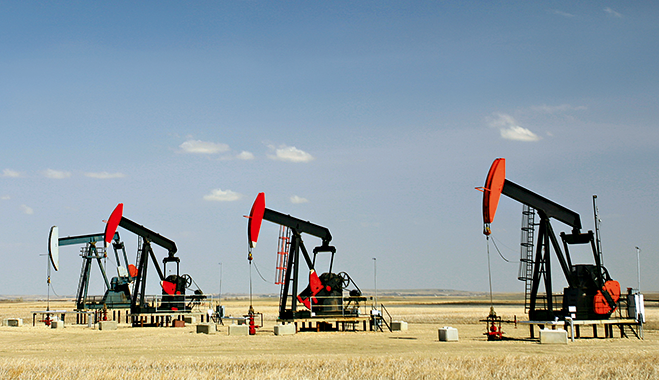 Pumpjacks on the prairie in Alberta, Canada. Energy production is booming across North America