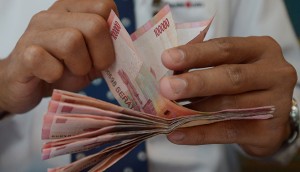 The Indonesian rupiah is feeling the effects of a stronger dollar, having dropped 1.9 percent against it - its lowest level since the financial crisis upset the Asian economy in 1998