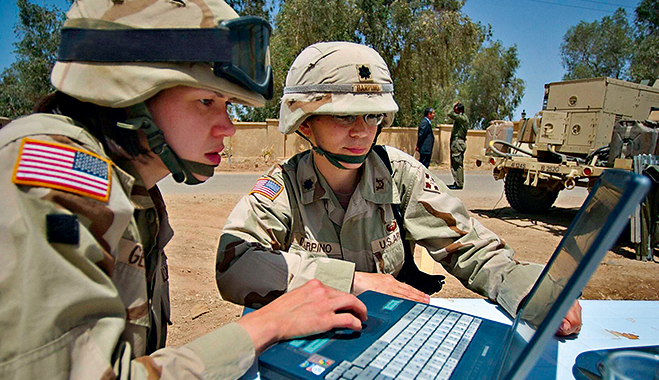 US army soldiers using intelligent services in combat. Military strategies can also be applied to corporate data management