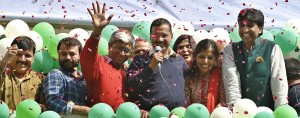 Arvind Kejriwal, leader of the Common Man Party, celebrates after winning in the elections for Delhi's assembly. The party has won popularity due to its pledge to fight for the common man