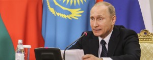 Putin speaks at the Eurasian Economic Union summit in Kazakhstan. The president is keen to unify Russia, Belarus and Kazakhstan's currency