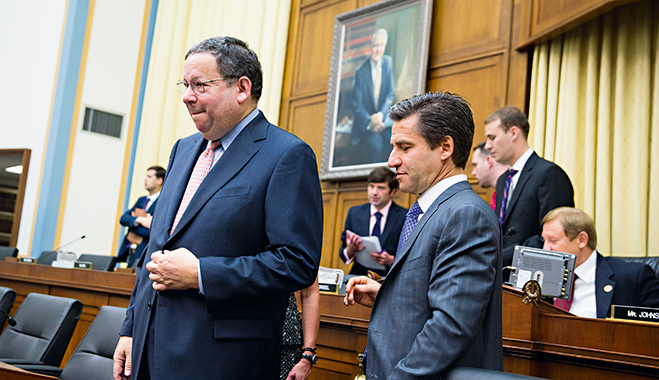David Cohen, Executive Vice President of Comcast (left), and Robert Marcus, Chairman and CEO of Time Warner Cable, at the start of a House Judiciary Committee hearing on the proposed merger between the companies