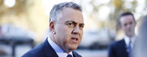 Treasurer Joe Hockey is deeply concerned by Australia's plummeting iron ore prices, which may force him to write-off $25bn in revenue for the next four years
