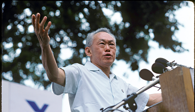 Lee Kuan Ye addresses supporters at a political rally in Fullerton Square, Singapore. The leader is credited with transforming the country's fortunes