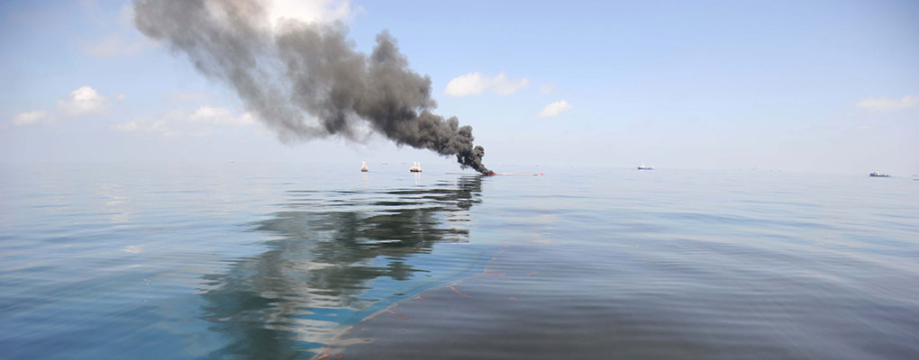 Oil burns in the Gulf of Mexico following the Deepwater Horizon oil spill. BP has been ordered to pay a record $18.7bn fine - in addition to $43.8bn of damages related to the disaster