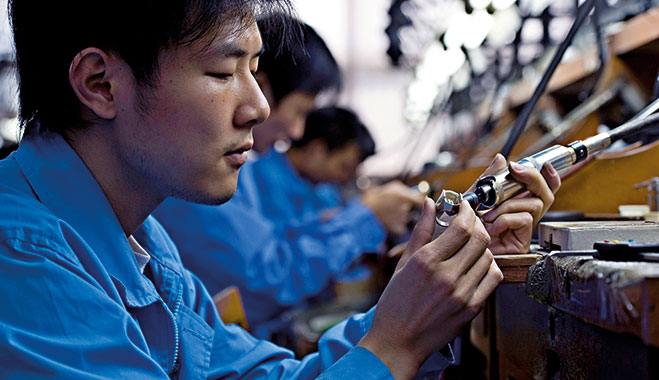 A farmer in Longsheng, Guangxi Province. Before manufacturing, agricultural jobs were the norm in China