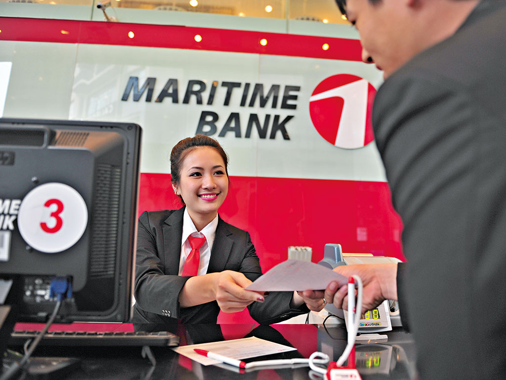 A transaction at a Martime Bank branch, which is based in Vietnam. The country's prospects are improving rapidly thanks to more foreign direct investment