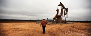 A worker at a Texas oil plant. The US is struggling to adapt to a slump in oil prices - and now its shale industry is in trouble
