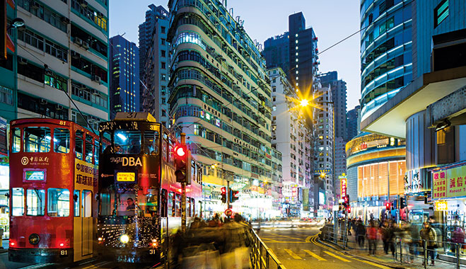 Street trams in Hong Kong. As one of Hong Kong’s top insurers, AXA GI is committed to protecting people at every stage of their lives