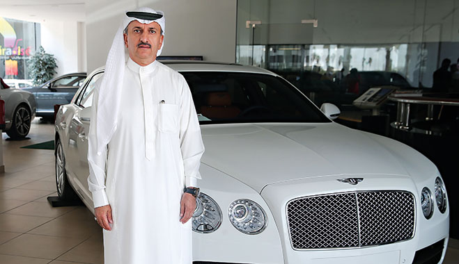Al Ghassan’s Owner Sheikh Ghassan, standing in front of one of the company’s Bentley’s. Al Ghassan Bentley is part of the company’s luxury car distribution