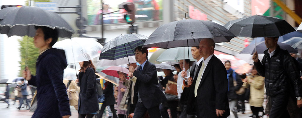 Pedestrians in Tokyo. The Japanese economy has slept into its fourth recession since the financial crisis
