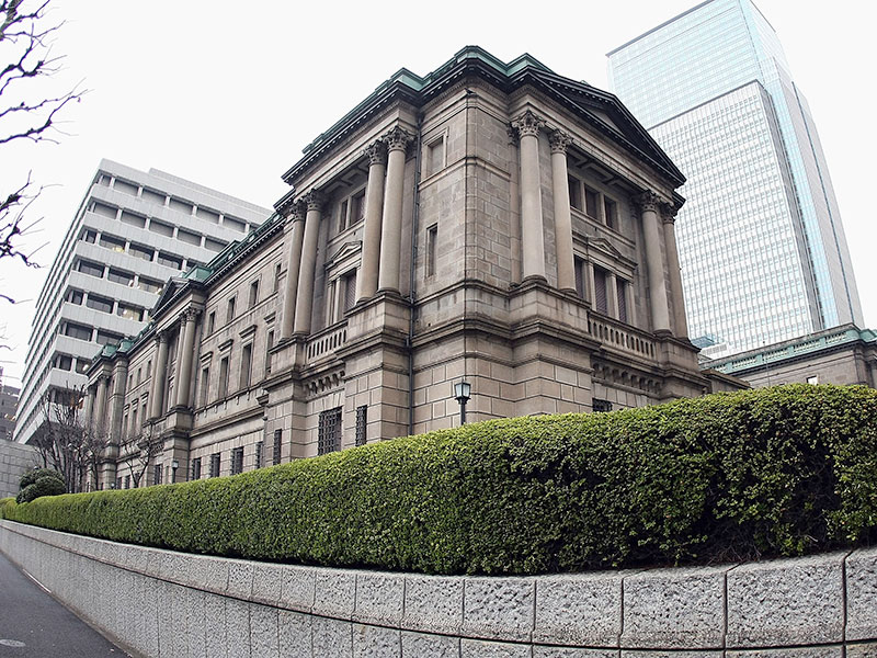 The Bank of Japan's headquarters in Tokyo. The central bank announced that policy rates would stay put and revealed hopes of an optimistic future for the economy