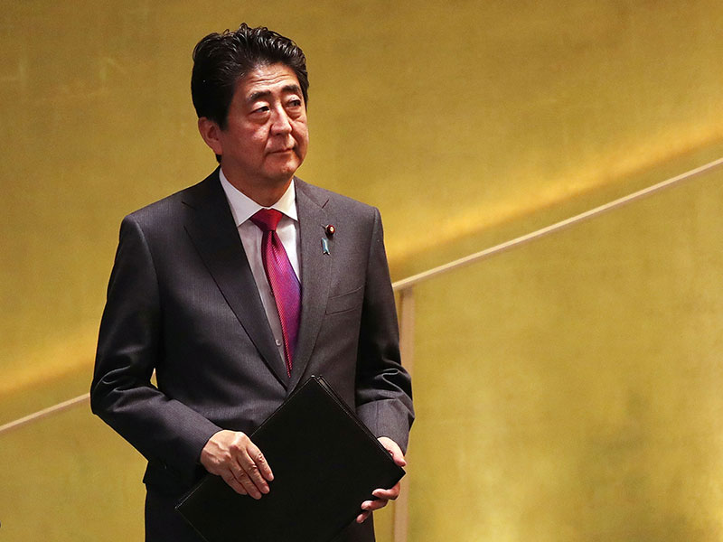Japanese Prime Minister Shinzo Abe has appointed two new members to the Bank of Japan's board, replacing the last remaining dissenters