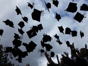 Students graduating from the University of Birmingham, UK. As student debt in both the UK and the US reach unprecedented levels, experts warn that both loan systems require a dramatic overhaul