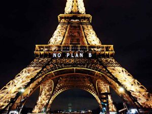 The Eiffel Tower displays messages during the COP21 climate summit in Paris
