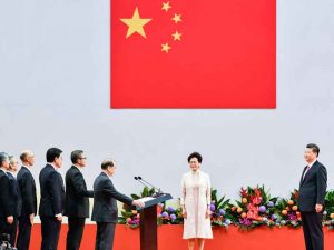 Carrie Lam is sworn in by President Xi Jinping during her inauguration in Hong Kong in July