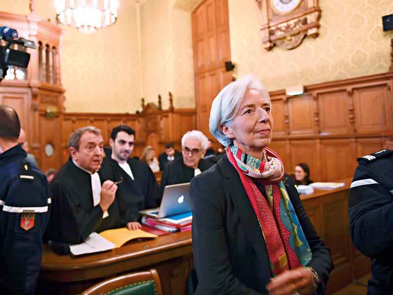Lagarde in a Paris courtroom prior to the start of her fraud trial