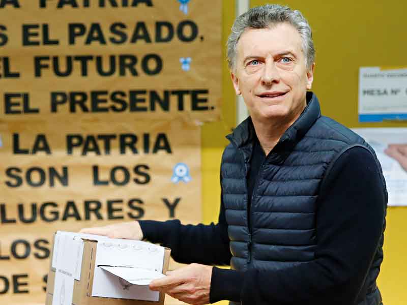 Argentine President Mauricio Macri casts his vote in the 2017 primary elections