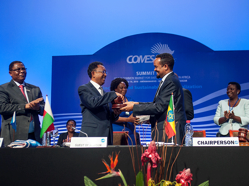 Hery Rajaonarimampianina, President of Madagascar, and Ethiopia’s Finance Minister, Ahmed Shide, attend the 2016 Summit of the Common Market For Eastern and Southern Africa