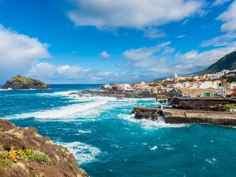 A coastal village in Tenerife, the largest and most populated of the Canary Islands. The island chain is traditionally know for tourism, but it is also home to a thriving business environment