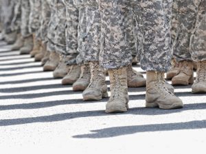 Identity economics helps to explain why, despite flat wage structures and relatively low pay, there is such a strong sense of identity and loyalty in the military