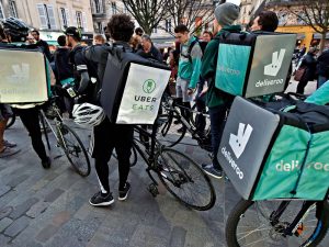 Delivery workers take part in a demonstration in Bordeaux, France